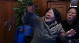 Relatives of passengers of the missing Malaysian Airline MH370 become hysterical as Malaysia confirms jet had crashed. Courtesy Reuters.  Photo grabbed from Reuters video