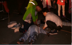 AN unconscious patient saved from a fire at a rural South Korean hospital is being revived.  The fire at a rural hospital for chronically ill elderly patients killed 21 people and injured eight in the second major fire this week. (Photo grabbed from Reuters video)