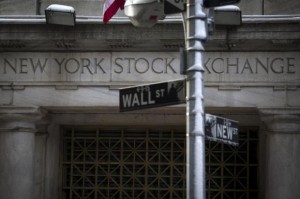  The Wall St. sign is seen outside the door to the New York Stock Exchange in New York's financial district February 4, 2014. Credit: Reuters/Brendan McDermid 