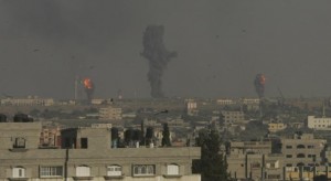 Smoke and flames are seen following what witnesses said were Israeli air strikes in Rafah in the southern Gaza Strip July 7, 2014. Credit: Reuters/Abed Rahim Khatib