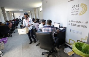  Election officials work in the operations rooms of the High National Elections Commission after elections yesterday in Tripoli, June 26, 2014. Credit: Reuters/Ismail Zitouny 