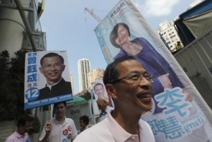 Jasper Tsang Yok-sing, candidate from the pro-Beijing "Democratic Alliance for the Betterment and Progress of Hong Kong" (DAB), campaigns on election day for the Legislative Council in Hong Kong, in this September 9, 2012 file picture.  REUTERS/Tyrone Siu/Files