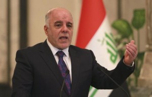 Iraq's Prime Minister-designate Haider al-Abadi gestures during a news conference in Baghdad August 25, 2014.  REUTERS/Mahmoud Raouf Mahmoud