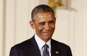  U.S. President Barack Obama smiles after he awards two Medals of Honor for actions during the Vietnam War while in the East Room of the White House in Washington, September 15, 2014. Credit: Reuters/Larry Downing