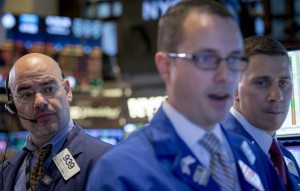 Traders work on the floor of the New York Stock Exchange