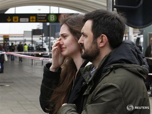 Family members of passengers on the Germanwings plane that crashed arrive at Barcelona's El Prat airport. REUTERS/Gustau Nacarino