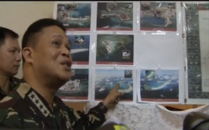 Chief of staff for the Armed forces of the Philippines, Gregorio Catapang, shows satellite photos of China's reclamation activities in disputed islands and expresses concern over China's actions. (Photo grabbed from Reuters video/Courtesy Reuters)