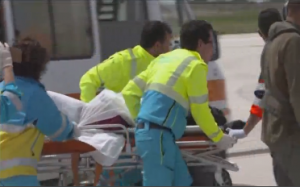 ITALIAN coastguard rescues 20 women, 47 men and two children - many with severe burns - off the coast of Italy, take them for care in Lampedusa, an island in Italy.  (Photo grabbed from Reuters video/Courtesy Reuters)