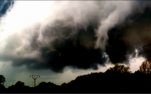 One bystander managed to safely film the tornado as it passed through the countryside.