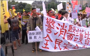 Labor Day demonstrators in Taiwan.  (Photo grabbed from Reuters video)