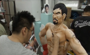 Cake artists unveil a life-sized cake of Manny Pacquiao, while other bake shops offer a limited edition cakes to celebrate the upcoming fight in Las Vegas. (Photo grabbed from Reuters video)