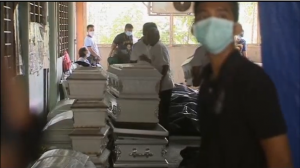 Coffins for the bodies recovered from the Valenzuela slipper factory fire were piled one on top of the other.  Authorities are now investigating the case.  (Eagle News)