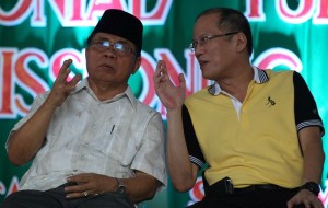 President Benigno S. Aquino III with MILF Central Committee chairman Al Haj Murad Ebrahim graces the ceremonial turnover of crew-served weapons and high powered firearms and the decommissioning of combatants of the Bangsamoro Islamic Armed Forces of the Moro Islamic Liberation Front (BIAF-MILF) at the Old Maguindanao Provincial Capitol in Simuay, Sultan Kudarat, Maguindanao on Tuesday (June 16).  The government and the MILF agreed to undertake the ceremonial turnover of the 75 weapons of the BIAF-MILF as provided in the Phase 1 of the Normalization Program for the Bangsamoro. (Photo by Ryan Lim / Malacañang Photo Bureau)