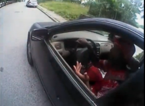 Samuel Dubose, 43, is seen here still talking to the police before he was fatally shot.  A Cincinnati campus police officer has been charged with the murder of Dubose, who was unarmed, during a traffic stop and video from the officer's body camera has been released showing the incident.  (Courtesy Hamilton Couny Prosecutor's Office/Reuters, Photo grabbed from police body camera video provided by Reuters)