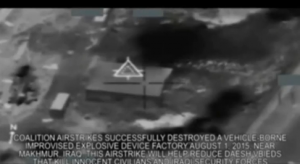 A U.S. military video shows what is says are coalition air strikes against Islamic State targets in Iraq. (Courtesy Reuters/Photo grabbed from Reuters video)