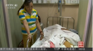 The janitor recovering at a local hospital in China.  (Photo grabbed from CCTV/Courtesy CCTV)