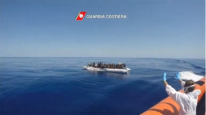 The Italian coast guard releases video of some 111 migrants being rescued from a deflating rubber dinghy in the Mediterranean sea. (Courtesy Reuters- GUARDIA COSTIERA HANDOUT)