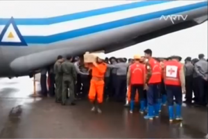 Aid arrives into Myanmar's Sittwe airport after deadly monsoon rains displaces tens of thousands of people. (Courtesy MRTV/Reuters)