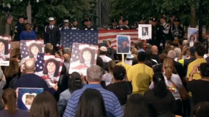 Solemn ceremony at the site of the World Trade Center marks the 14th anniversary of the September 11, 2001 attacks.  (Courtesy Reuters/Photo grabbed from Reuters video)