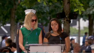 Relatives mourn their loved ones killed in the September 11, 2001 attacks.  (Photo grabbed from Reuters video)