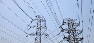 In this photo taken on Friday, May 27, 2011, electric pylons are seen against commercial buildings at the central business district in Beijing, China. The country has raised electricity rates for some industrial users as parts of the country grapple with their worst energy crisis in years, despite concerns higher costs may add to inflation. (AP Photo/Andy Wong) (Photo courtesy of http://asiancorrespondent.com/topic/mindanao-power/)