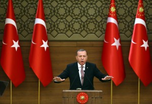 Turkey's President Recep Tayyip Erdogan delivers a speech during the monthly Mukhtars meeting (local administrators) at the Presidential Complex in Ankara on February 10, 2016. Turkish President Recep Tayyip Erdogan on February 10 accused the United States of creating a "pool of blood" in the region by failing to recognise the main Syrian Kurdish organisations as terror groups. / AFP / ADEM ALTAN