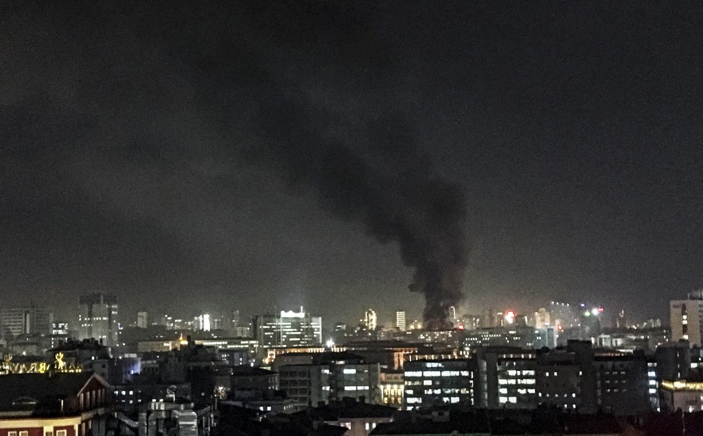 TURKEY OUT Smokes rises above buildings following an explosion after an attack targeted a convoy of military service vehicles in Ankara on February 17, 2016.  At least five people were killed and 10 people were wounded in a car bombing in the Turkish capital Ankara on February 17, the city's governor said. The attack targeted a convoy of military service vehicles, Ankara governor Mehmet Kiliclar said, quoted by the CNN-Turk and NTV channels. / AFP / IHLAS NEWS AGENCY / STRINGER / Turkey OUT