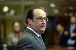 French President Francois Hollande arrives at the European Union Council building to attend the working dinner of the European Summit in Brussels February 19, 2016. British Prime Minister David Cameron haggled with European leaders deep into a second night of summit talks on Friday, facing tough resistance to his bid for a reform deal to keep his country in the EU. / AFP / THIERRY CHARLIER