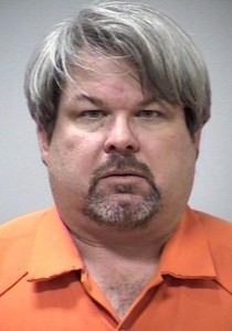 (FILES) This file photo released by the Kalamazoo County Sheriff's Office on February 21, 2016, shows Jason Brian Dalton, 45, suspected of killing six people in a shooting spree in the northern US state of Michigan, police said. An Uber driver who may have picked up fares during a weekend killing spree was formally charged with six counts of murder in the US state of Michigan on February 22, 2016.Jason Brian Dalton, 45, sat stony-faced in an orange prison jumpsuit, thick glasses shielding his downcast eyes, as a judge read the charges against him in a Kalamazoo court. Dalton appeared via videoconference from the jail.  / AFP / Kalamazoo County Sheriff's Office / HO