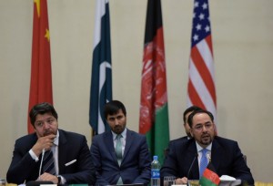 Afghan Foreign Minister Salahuddin Rabbani (R) chairs the fourth round of four-way peace talks at the presidential palace in Kabul on February 23, 2016. The Afghan government expects a date to be set by the Qaudrateral Coordinating Group (QCG) for direct peace talks with the Taliban by the end of this month, Rabbani said on February 23. AFP PHOTO / SHAH Marai / AFP / SHAH MARAI