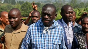 Kizza Besigye arrives at a polling station to vote in Rukungiri, his hometown, on Feb. 18. (Photo grabbed from AFP)