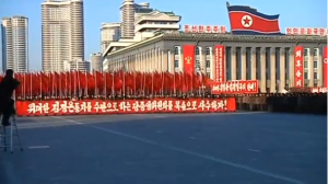 Thousands of North Koreans holding banners during the mass rally held in Pyongyang to affirm their loyalty to the Workers' Party of Korea and its leader, North Korean Supreme Leader Kim Jong-un. (Photo courtesy: Reuters/Photo grabbed from Reuters video)