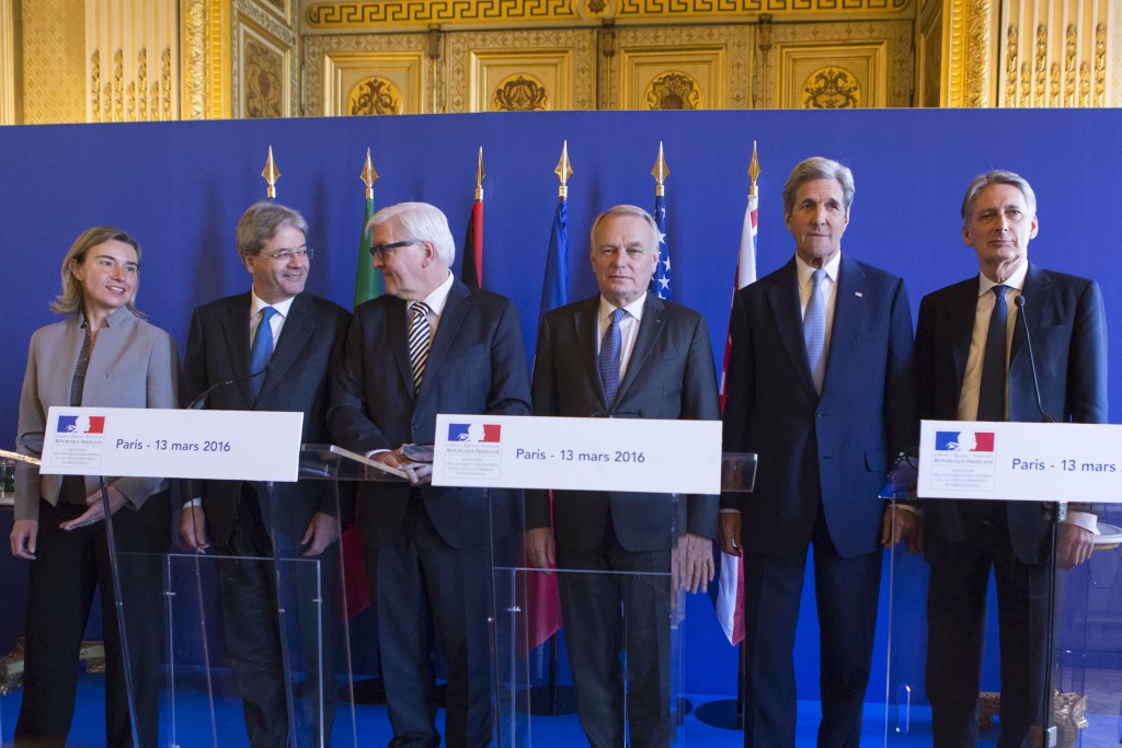 The EU Foreign Policy chief Federica Mogherini, Italian Foreign Minister Paolo Gentiloni, German Foreign Minister Frank-Walter Steinmeier, French Foreign Minister Jean-Marc Ayrault, US Secretary of State John Kerry (L) and British Foreign Secretary Philip Hammond pose within g a meeting between the US and its European allies on the situations in Libya, Syria, Ukraine and Yemenon March 13, 2016 in Paris. (AFP)