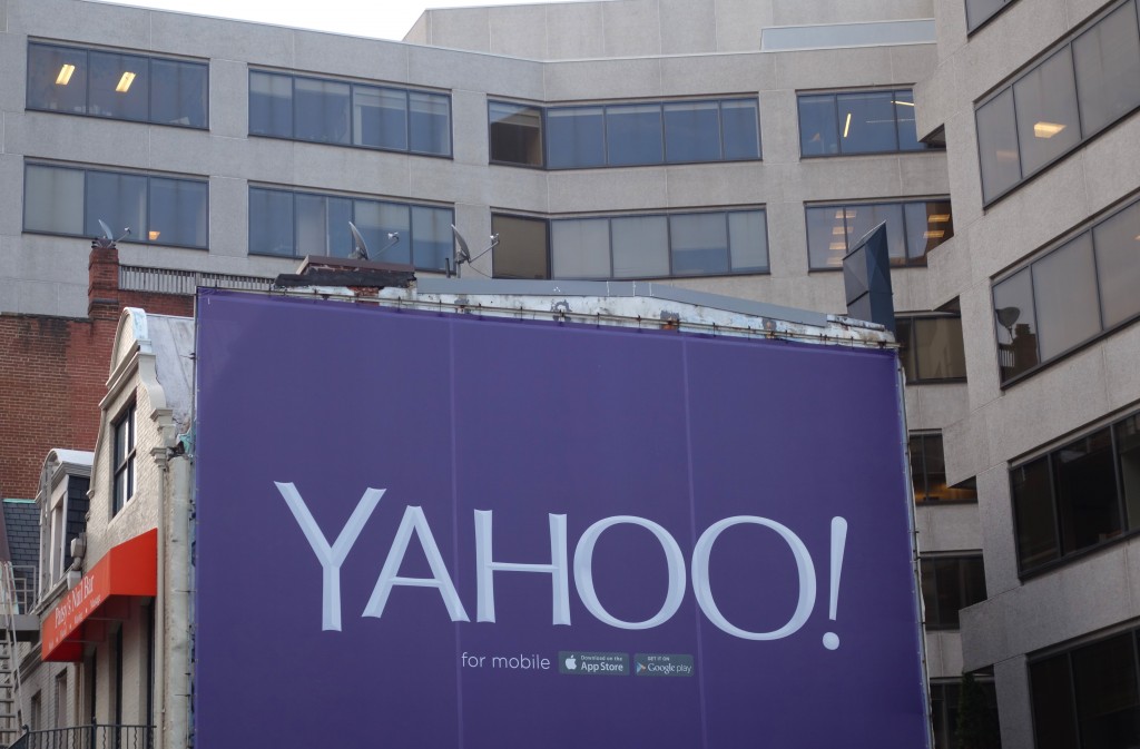 (FILES) This file photo taken on August 5, 2015 shows a billboard for the technology company Yahoo in Washington, DC.  An activist hedge fund on March 24, 2016 launched a bid to replace the entire Yahoo board of directors, saying the struggling Internet firm's management team has "failed to deliver results." In an open letter to Yahoo shareholders, Starboard Value LP said it would nominate nine "highly qualified" directors to the company's board, following a threat made last year to do so if it was unsatisfied with the pace of change.  / AFP / KAREN BLEIER