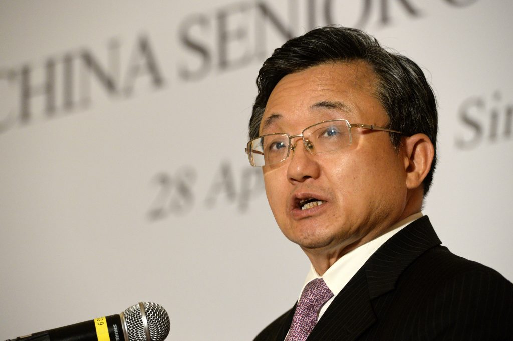 China's Foreign Affairs Vice Minister Liu Zhenmin briefs the media after the 22nd ASEAN-China Senior Officials Consultations meeting in Singapore on April 28, 2016. China and ASEAN senior officials met in Singapore to discuss the implementation of a declaration on conduct in the South China Sea. / AFP PHOTO / ROSLAN RAHMAN