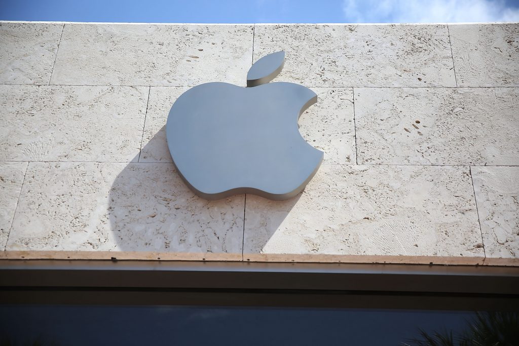 MIAMI BEACH, FL - APRIL 26: An Apple sign is seen outside of a store on April 26, 2016 in Miami Beach, Florida. Investors are awaiting Apple Inc. scheduled reporting today of its fiscal quarter that ended March 26. Joe Raedle/Getty Images/AFP