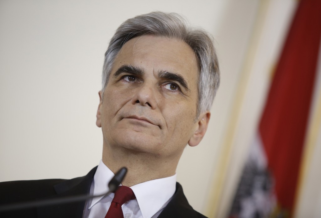 Austrian Chancellor Werner Faymann gives a press statement after his meeting with EU Council President Donald Dusk on March 1, 2016 in Vienna.  / AFP PHOTO / Dieter Nagl