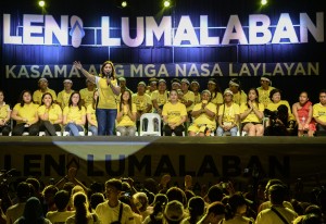 Philippines vice presidential candidate Leni Robredo addresses her supporters during a campaign rally in Manila on May 6, 2016. Anti-establishment Philippine politician Rodrigo Duterte's rollicking ride to presidential favouritism has triggered warnings of a coup should he win next week's election, with opponents warning he is a dictator in the making. / AFP PHOTO / MOHD RASFAN