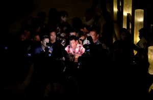 Philippines Presidential frontrunner and Davao City Mayor Rodrigo Duterte (C) is interviewed by reporters at a hotel in Davao City on the southern island of Mindanao on May 9, 2016.  Anti-establishment firebrand Rodrigo Duterte was heading for a huge win  in the Philippine presidential elections, according to a poll monitor, after an  incendiary campaign dominated by his profanity-laced threats to kill criminals. / AFP PHOTO / NOEL CELIS