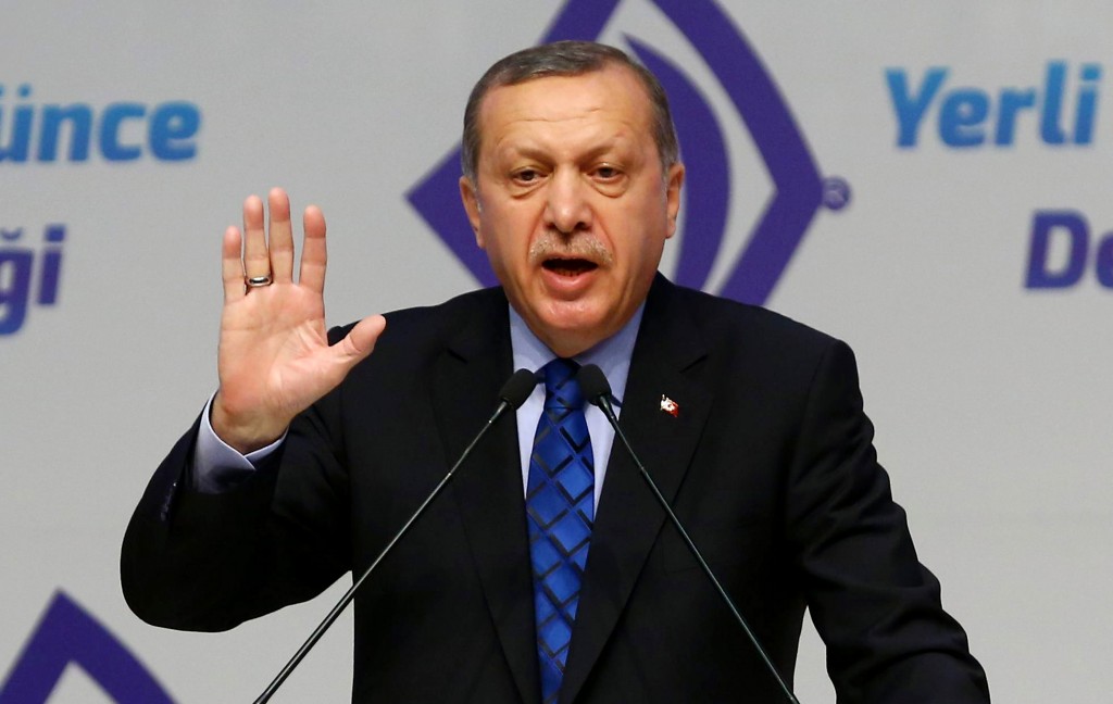 Turkish President Recep Tayyip Erdogan delivers a speech during an event entitled "Domestic and national will in Turkish political History" at ATO Congress Center in Ankara, on May 12, 2016.   / AFP PHOTO / ADEM ALTAN