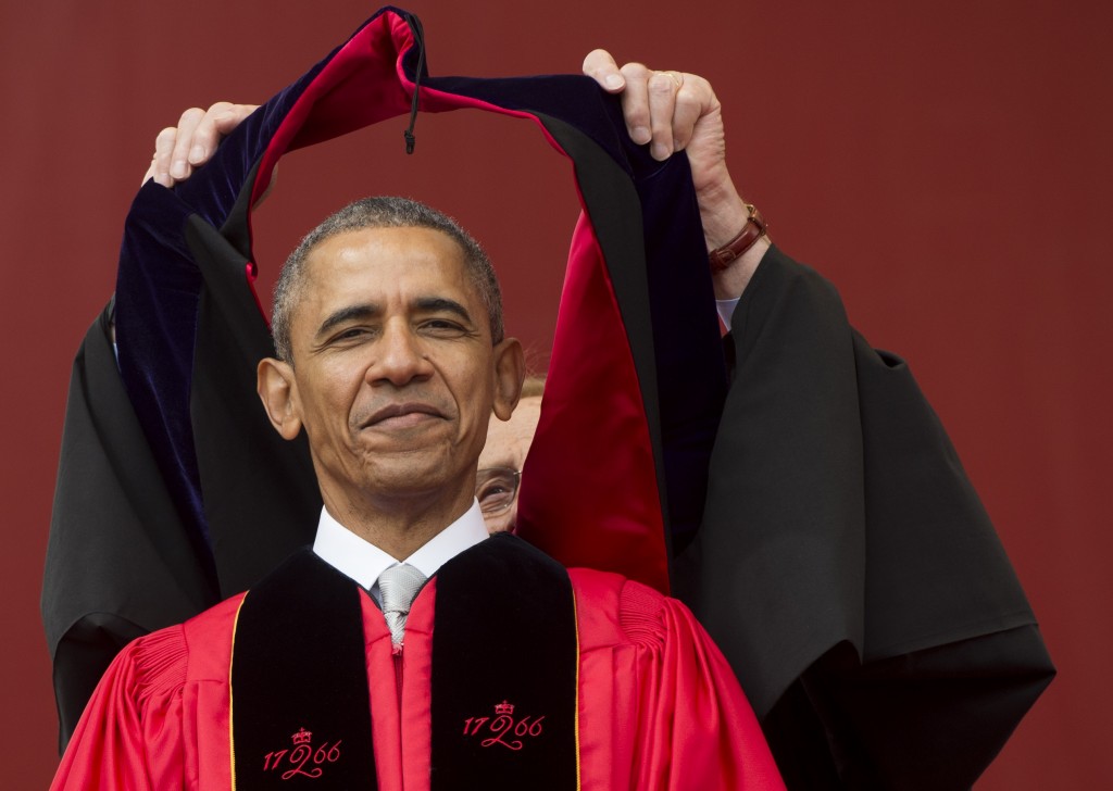 US President Barack Obama receives an honorary degree during the commencement ceremony for Rutgers University at High Point Solutions Stadium in Piscataway, New Jersey, May 15, 2016. / AFP PHOTO / SAUL LOEB