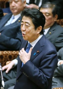 Japanese Prime Minister Shinzo Abe answers a question during a lower house budget committee meeting at the parliament in Tokyo on May 16, 2016. Abe on May 16 vowed cooperation with French investigators probing payments allegedly made to help Tokyo secure the 2020 Olympics. / AFP PHOTO / JIJI PRESS / JIJI PRESS / Japan OUT