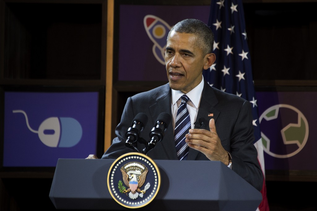 US President Barack Obama speaks after touring through the entrepreneur demonstrations at DreamPlex in Ho Chi Minh City on May 24, 2016. Obama told communist Vietnam on May 24 that basic human rights would not jeopardise its stability, in an impassioned appeal for the one-party state to abandon authoritarianism. / AFP PHOTO / JIM WATSON