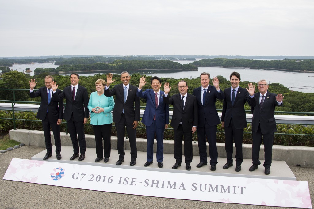 (From L) European Council President Donald Tusk, Italian Prime Minister Matteo Renzi, German Chancellor Angela Merkel, US President Barack Obama, Japanese Prime Minister Shinzo Abe, French President Francois Hollande, British Prime Minister David Cameron, Canadian Prime Minister Justin Trudeau and European Commission President Jean-Claude Juncker pose for the family photo during the first day of the Group of Seven (G7) summit meetings in Ise city on May 26, 2016. World leaders kick off two days of G7 talks in Japan on May 26 with the creaky global economy, terrorism, refugees, China's controversial maritime claims, and a possible Brexit headlining their packed agenda. / AFP PHOTO / AFP POOL / JIM WATSON