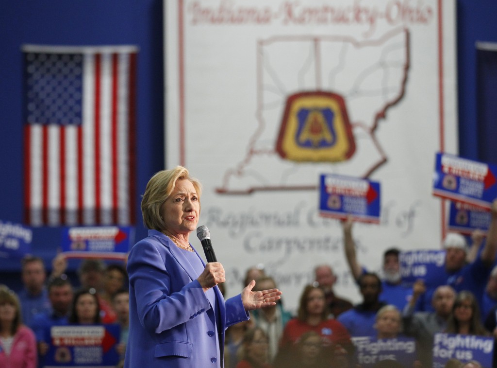 LOUISVILLE, KY - MAY 15: Democratic presidential candidate Hillary Clinton addresses the crowd during a campaign stop at the Union of Carpenters and Millwrights Training Center May 15, 2016 in Louisville, Kentucky. Clinton is preparing for Kentucky's May 17th primary. John Sommers II/Getty Images/AFP