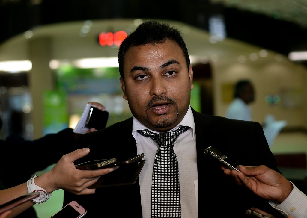 Malaysian lawyer Balan Nair, representing families of the ill-fated Malaysia Airlines flight MH17 crew members, speaks with journalists prior to filing the lawsuit at the Kuala Lumpur Courts Complex on June 2, 2016.  Families of six Malaysia Airlines crew members who perished when flight MH17 was shot down over Ukraine nearly two years ago filed a lawsuit blaming the carrier for the tragedy. / AFP PHOTO / MANAN VATSYAYANA