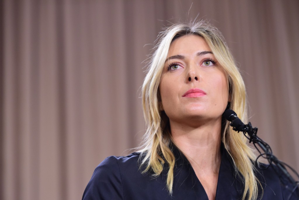 (FILES) This file photo taken on March 07, 2016 shows Russian tennis player Maria Sharapova speaking during a press conference in Los Angeles.   Russian tennis star Maria Sharapova has been banned for two years after failing a drug test, the International Tennis Federation (ITF) announced on June 8, 2016. Sharapova tested positive for the controversial banned medication meldonium during January's Australian Open.  / AFP PHOTO / Robyn BECK