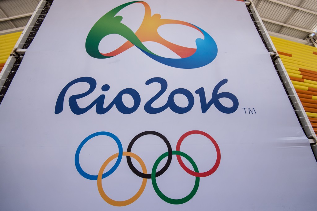 A banner with the Olympic logo for the Rio 2016 Olympic Games seen at the Olympic Tennis Centre of the Olympic Park in Rio de Janeiro, Brazil, on December 11, 2015.  AFP PHOTO / YASUYOSHI CHIBA / AFP PHOTO / YASUYOSHI CHIBA