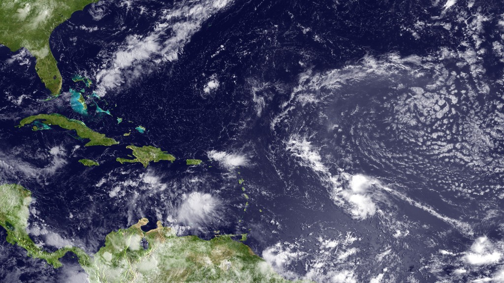 This National Oceanic and Atmospheric Administration (NOAA) satellite image shows the third named storm of the 2010 hurricane season, Tropical Storm Colin, seen in this visible imagery taken from the GOES-East satellite on August 3, 2010 at 1315z as the sun passed directly over the storm, creating a glare off of the ocean surface, about 945 miles east of the Lesser Antilles, moving west/northwest. Tropical Storm Colin's projected path remained well clear of the Gulf of Mexico where BP engineers were hoping to permanently plug the biggest oil spill in history. AFP PHOTO/NOAA/HANDOUT/RESTRICTED TO EDITORIAL USE  / AFP PHOTO / NOAA / HO