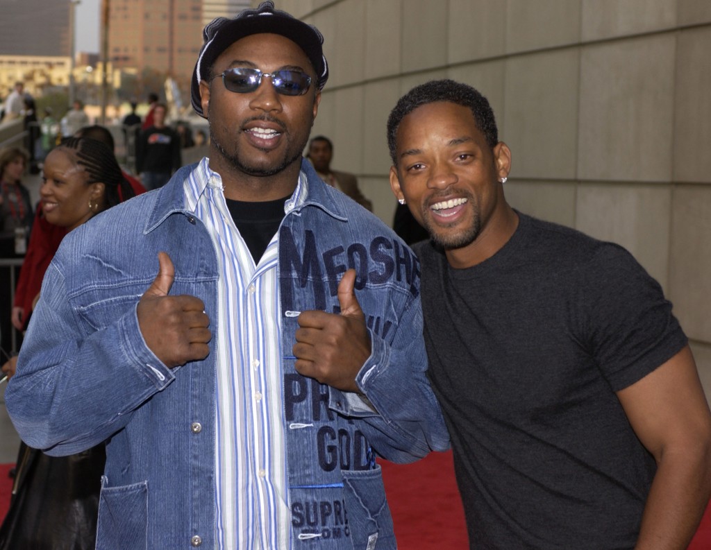 LOS ANGELES - FEBRUARY 15:  (L-R)  Boxer Lennox Lewis and actor Will Smith attend the 2004 NBA All-Star Game held at the Staples Center, February 15, 2004 in Los Angeles, California.  (Photo by Vince Bucci/Getty Images) *** Local Caption *** Lennox Lewis;Will Smith